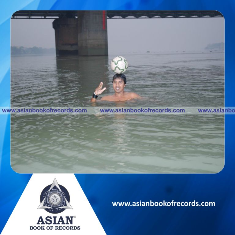 Longest Distance of Swimming with a Football on Head by an Individual (Male)