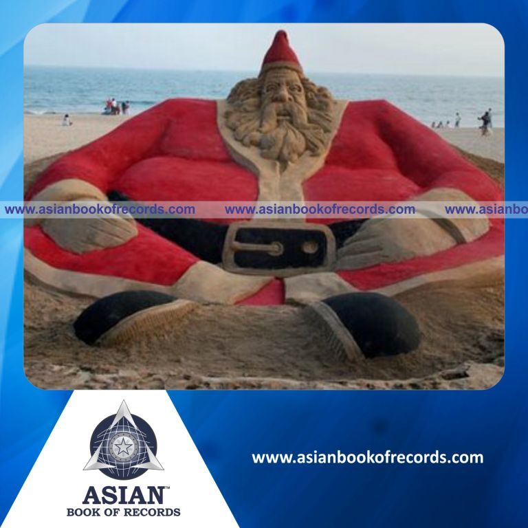Largest Sand Sculpture of Santa Claus made by a Team