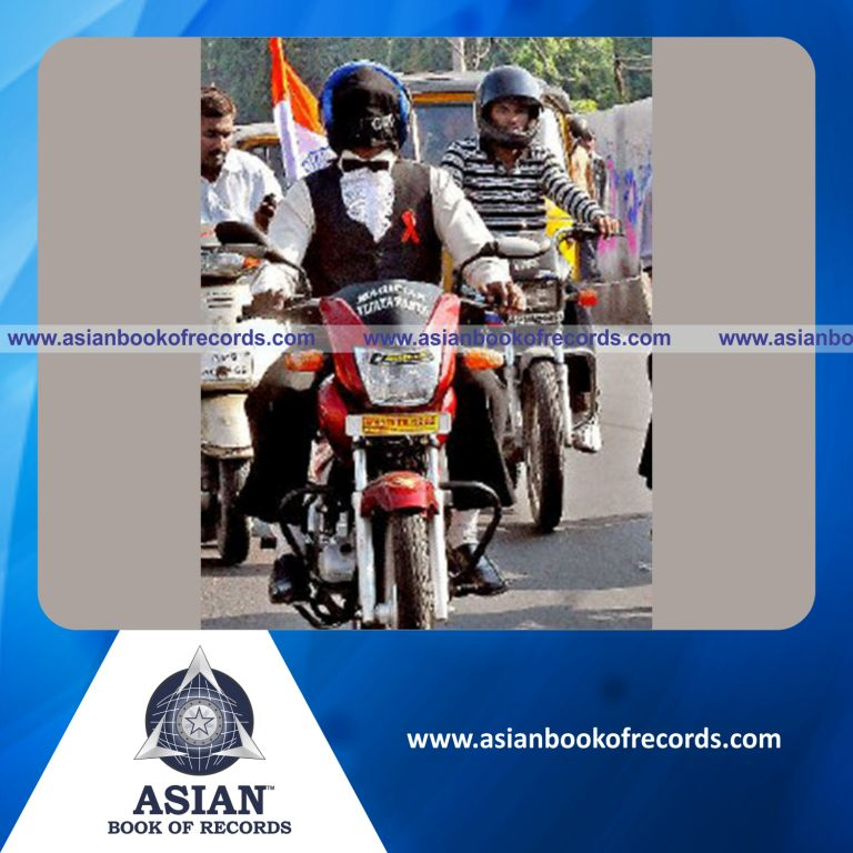 Longest Two Wheeler Ride while Blindfolded by an Individual (Male)