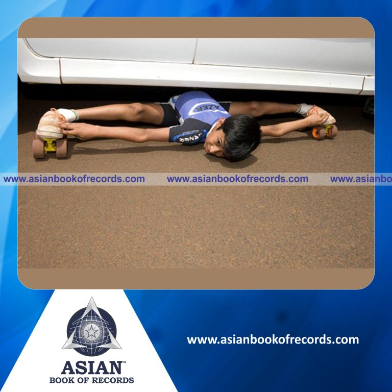 Longest Distance Limbo Skating Under Cars by a Minor (Male)