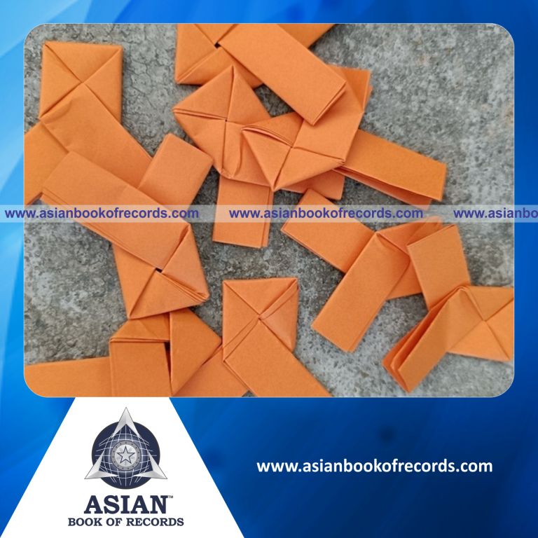 Highest Number of Origami Orange Ribbons Folded by a Team in One Hour