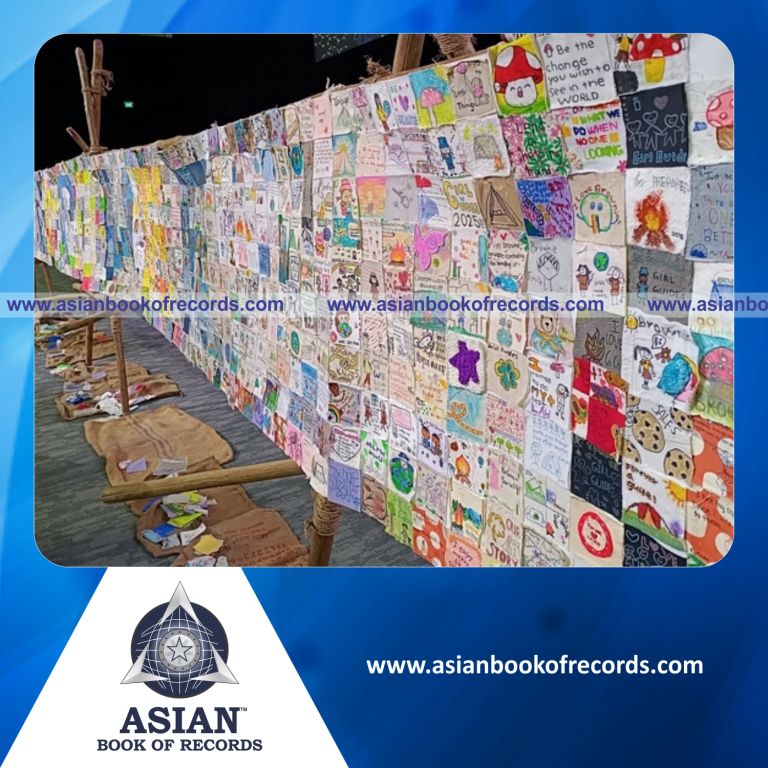 Highest Number of Fabric Pieces with Handwritten Notes Used in a Banner
