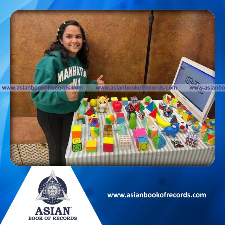 Highest Number of Different Types of Rubik’s Cubes Solved While Moving on a Hoverboard by a Kid