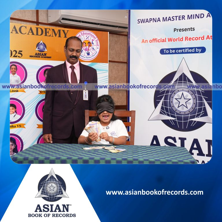 Highest Number of Currencies Identified in 2 Minutes while Blindfolded by a Pre-Schooler